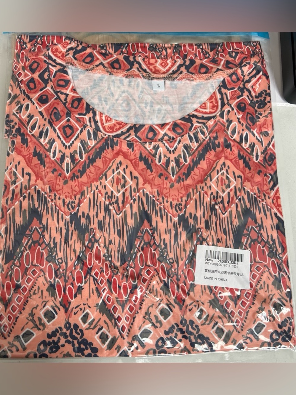 Coral and Black Aztec Print Tee size large